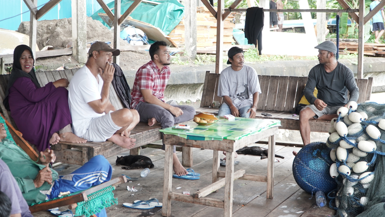 Rafid and Ancul are listening to Banda Naira's purse seine fishers about their perception of conservation
