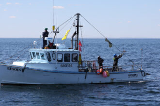 Catching the drone from back deck of F/V Resolve