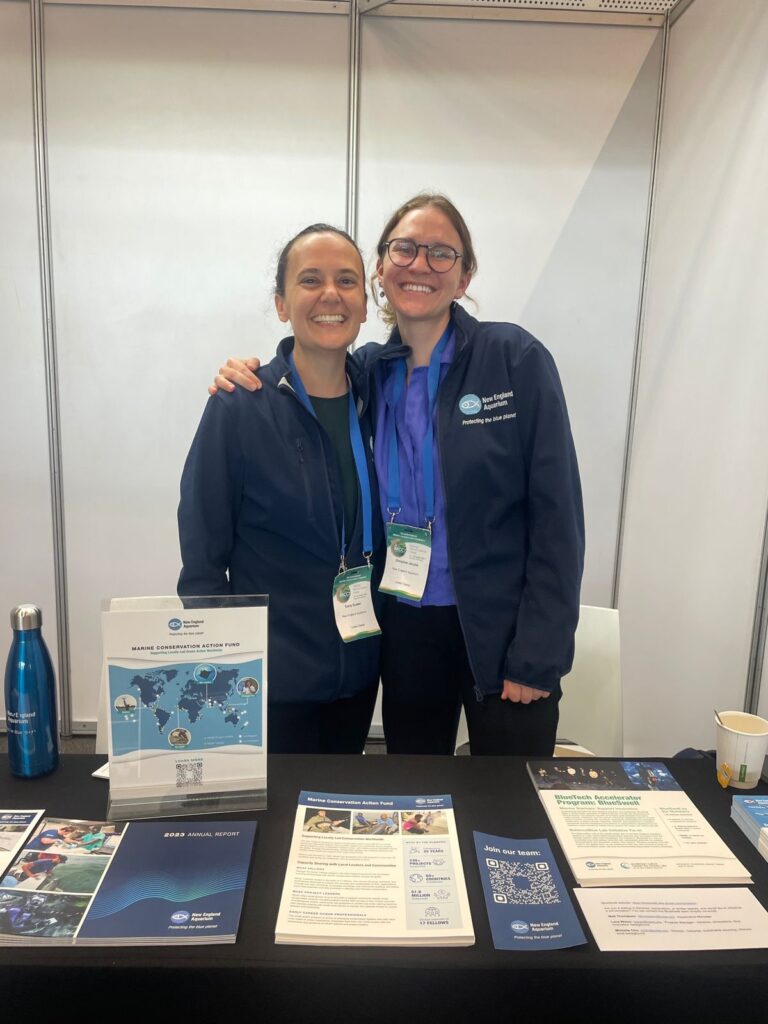 MCAF Program Manager Emily Duwan and MCAF Program Officer Christina Janulis at the New England Aquarium Booth.